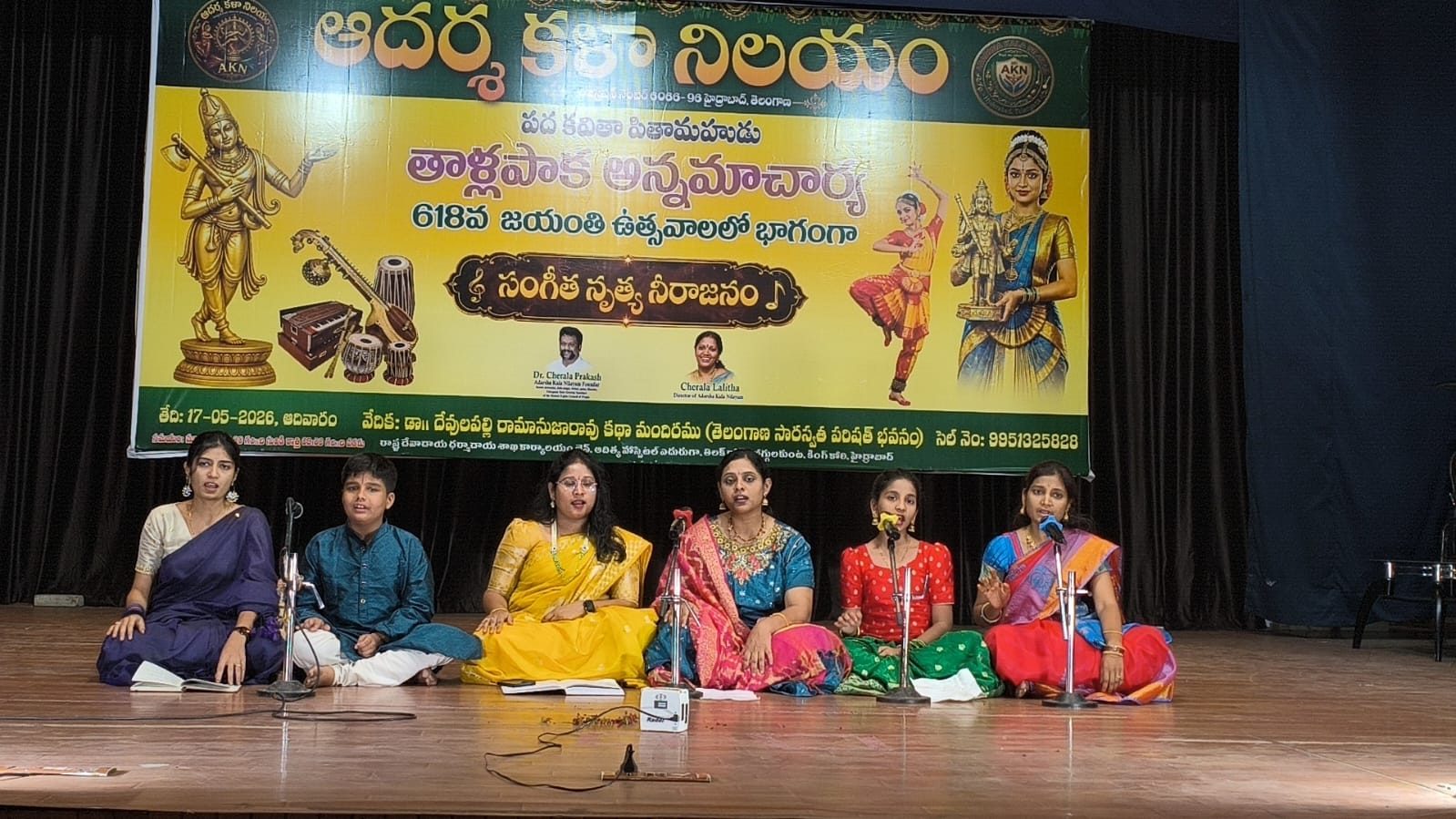 Samsruthi students performing a vocal concert on stage