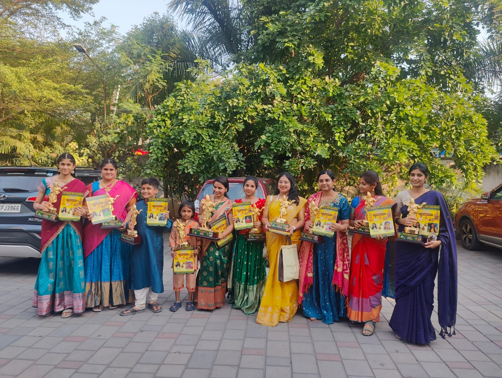 Students and parents with their certificates